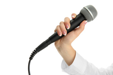 Wall Mural - female hand with microphone isolated on white