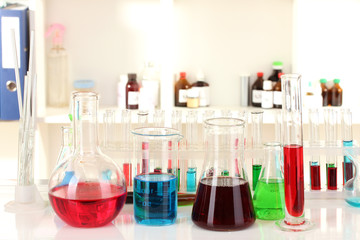 Different laboratory glassware with color liquid