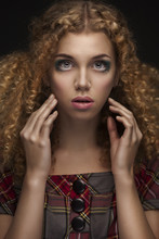 Young Beautiful Doll Girl With Curly Hair