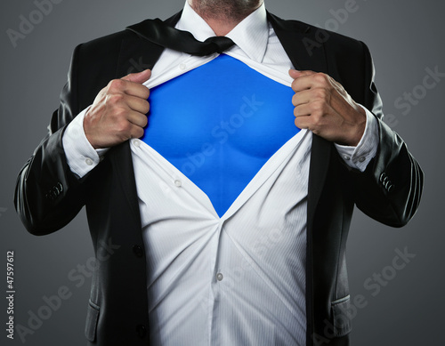Fotografía Young businessman acting like a super hero