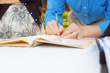 Signing a Guestbook