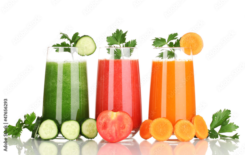 Fresh vegetable juices isolated on white