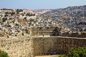 view from the walls of ancient jerusalem to city rooftops