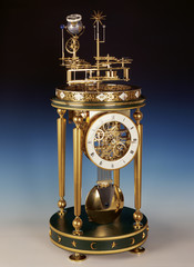 Antique clock with perpetual motion.