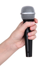 Wall Mural - Black microphone in hand isolated on white