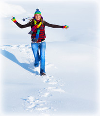 Canvas Print - Happy girl running in the snow