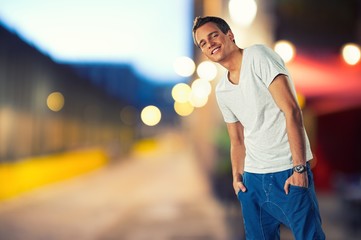 Sticker - Stylish young man over blurred background