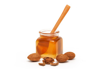 Honey in the jar and almonds