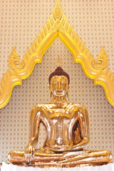 Wall Mural - golden Buddha at wat trimit in Thailand