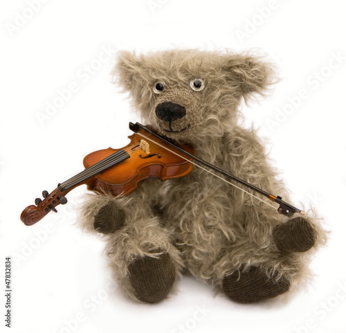 Obraz w ramie ours en peluche musicien
