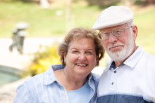 Happy Senior Couple In The Park
