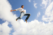 Man Jumping In The Air With Joy