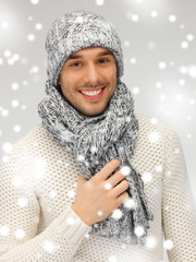 Canvas Print - handsome man in warm sweater, hat and scarf