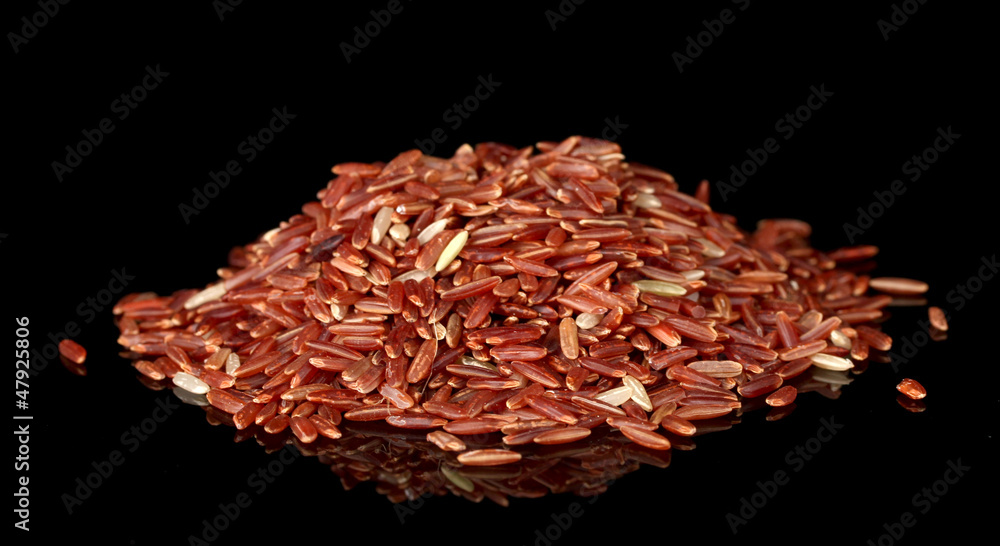 Red rice isolated on black