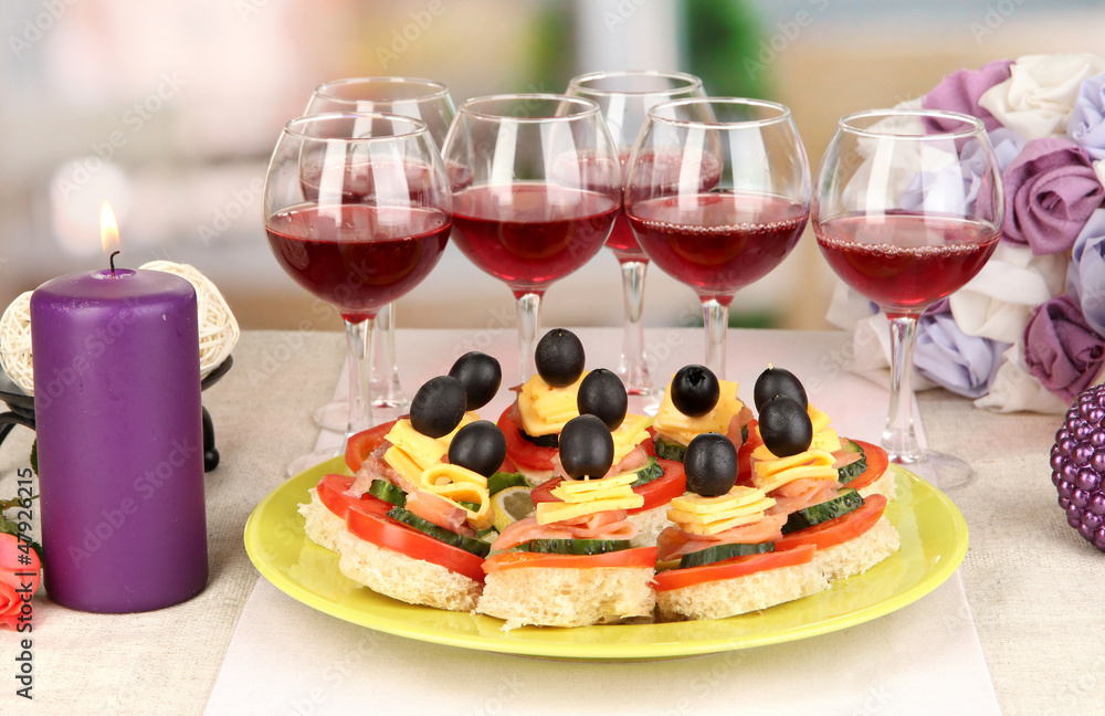 Canapes and wine in restaurant