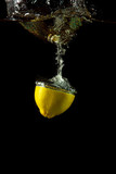 Fototapeta  - fresh lemon under water