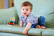 © Olesia Bilkei - curious little baby toddler playing toys