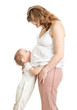 © Andrey Kuzmin - Little boy hugging pregnant mother's belly and looking up