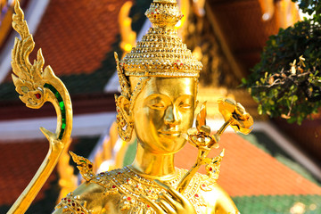 Wall Mural - Golden kinnara statue in Grand palace Bangkok,Thailand.