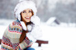 © ZoomTeam - Young woman winter portrait. Shallow dof.
