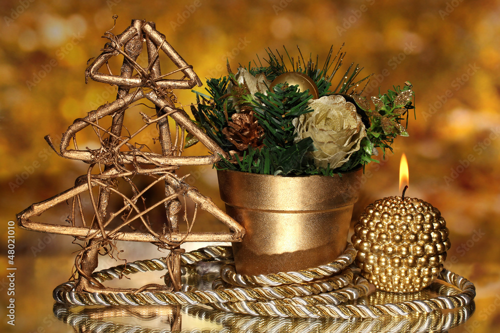 Christmas composition  with candles and decorations in gold