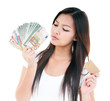 © iPortret - Young Woman Holding Credit Card And Money