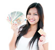 © iPortret - Happy Young Woman Holding Money And Credit Card