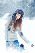 © ZoomTeam - Girl playing with snow in park