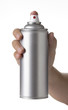 man hand spraying a blank sliver metal  spray paint can