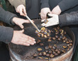 Warming hands on hot chestnuts