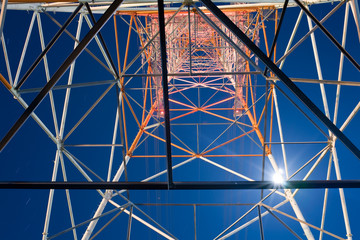 A Electricity Pylon under the full moon night