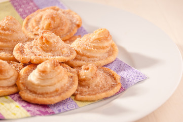 Homemade puff pastry cookies with sugar