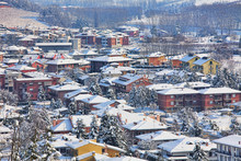 Small Town Covered By Snow. Piedmont, Italy.