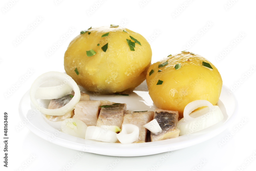 Dish of herring and potatoes on plate isolated on white