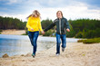 © Dmytro Titov - couple are walking on the beach
