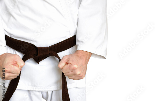 Fotoboard na płycie Człowiek w kimono i pas do sztuk walki na białym backgroun