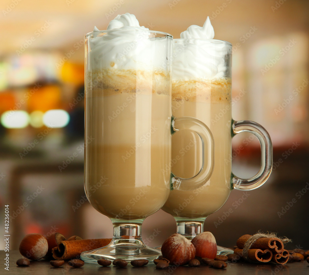 Fragrant coffee latte in glasses cups with spices,