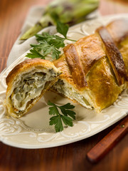 Poster - strudel with artichoke and ricotta, selective focus