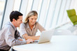 © Monkey Business - Business people Having Meeting Around Table In Modern Office