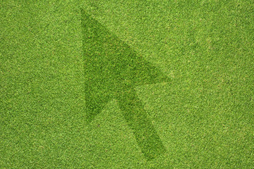 Wall Mural - Arrow  icon on green grass background