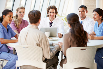 Wall Mural - Medical Team Discussing Treatment Options With Patients