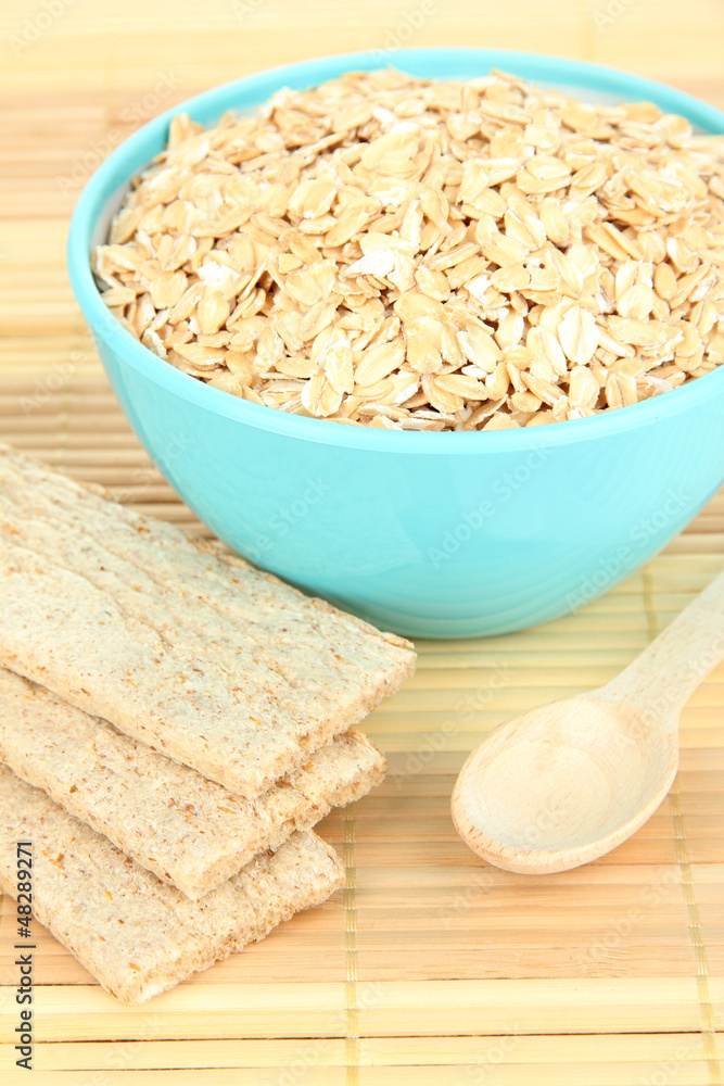 Blue bowl full of oat flakes