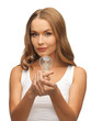 © Syda Productions - woman with energy saving bulb