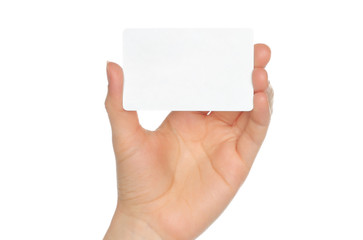 Wall Mural - Hand holds charge card on white background .