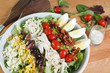 Entree sized serving of fresh hearty and colorful cobb salad