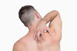 © WavebreakmediaMicro - Rear view of shirtless man with neck pain