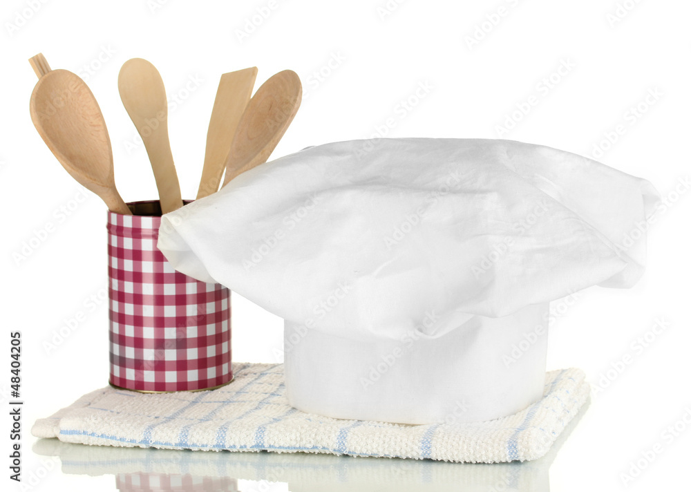 Chef's hat with kitchen towel and spoon isolated on white