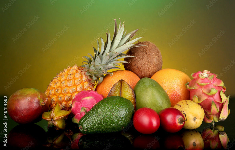 Composition of exotic fruits on colorful background
