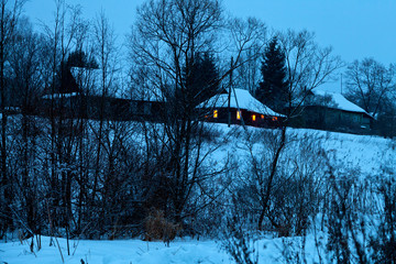 Sticker - snowed village in blue winter evening