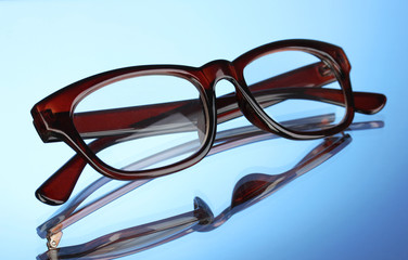 Sticker - Beautiful glasses on blue background